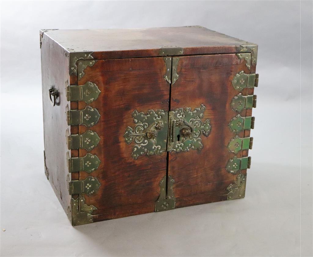 An Indo-Dutch satinwood and brass mounted cabinet, Batavia 1650-1680, Width 2ft 4in, depth 1ft 7in, height 2ft.